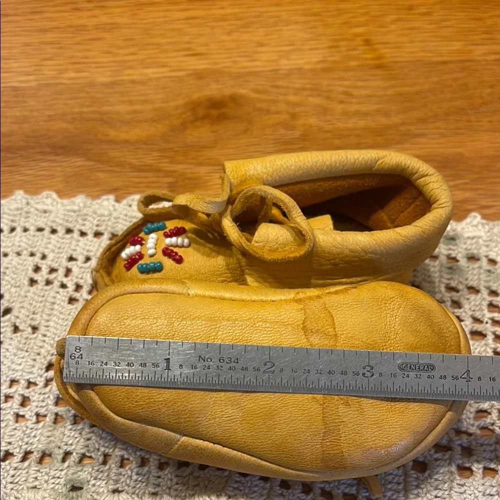 Vintage infant Moccasin Shoes with Soft Suede Material and Charming Design